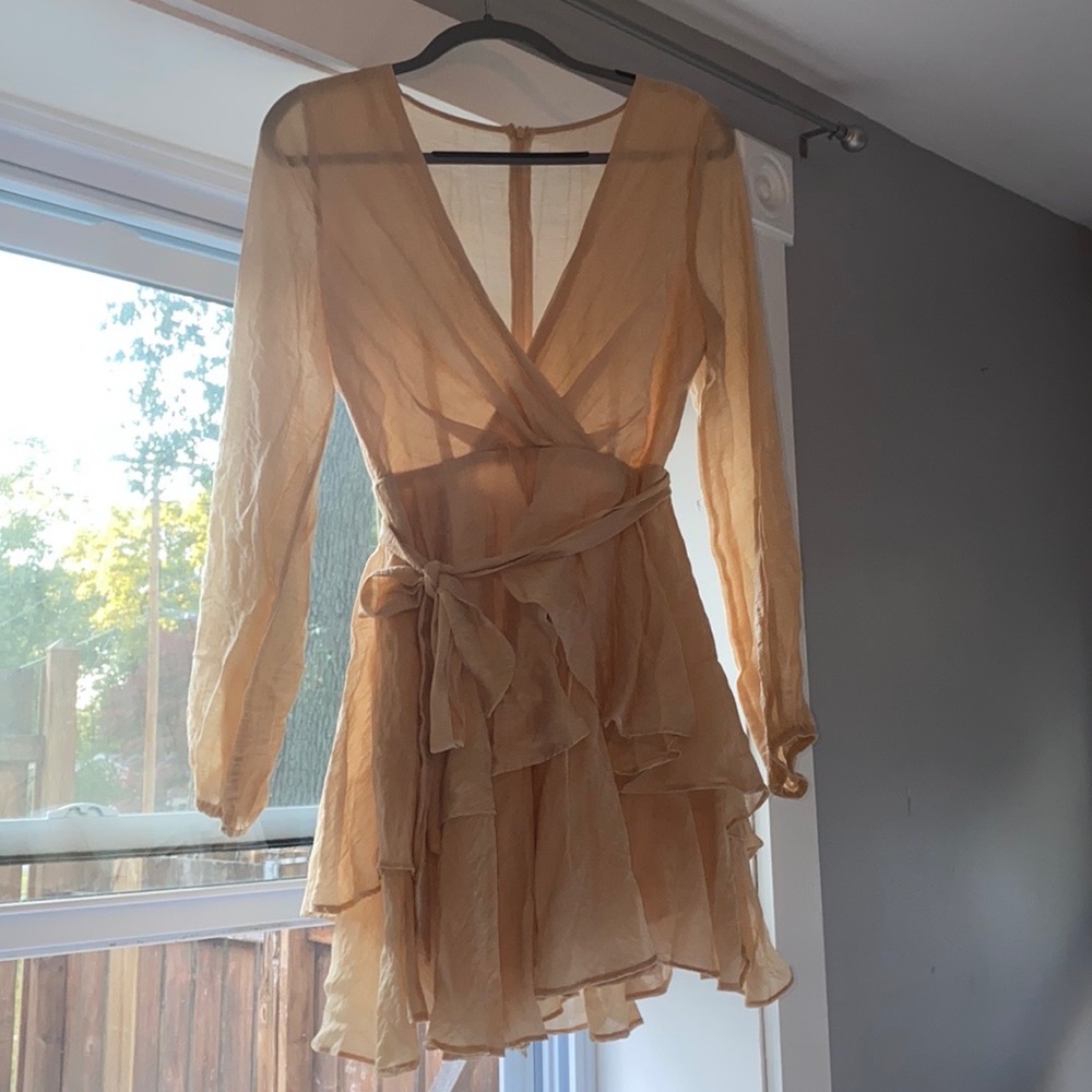 beige long sleeved tiered mini dress NWT